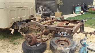 Dustless blasting of 4WD chassis before image