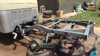 Dustless blasting of 4WD chassis before image