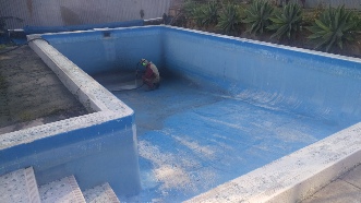 Dustless blasting of pools before image