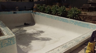 Dustless blasting of pools after image