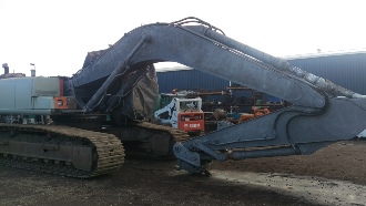 Dustless blasting of large excavator after image