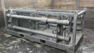 Dustless blasting of industrial piping, pumps, engineering and construction after image